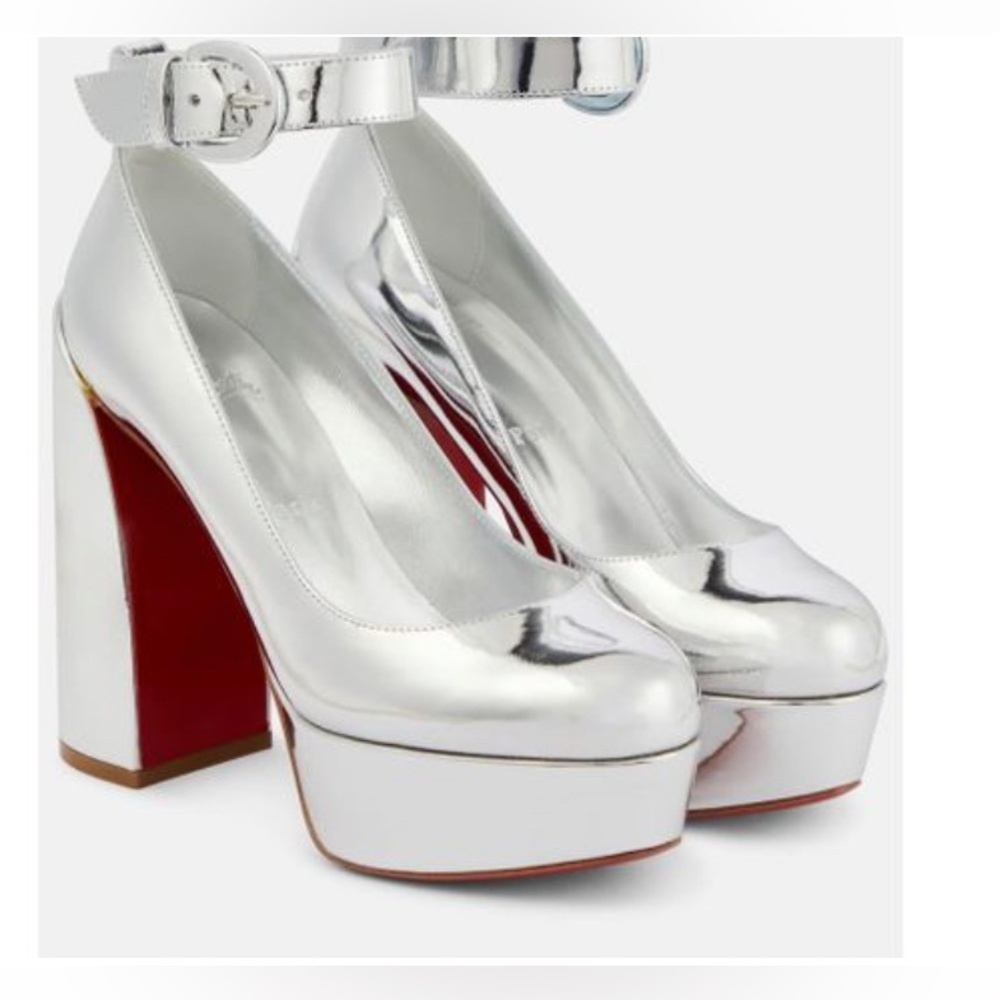 Christian Louboutin 
Silver Platform Heels